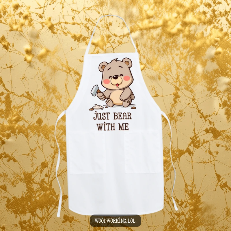 Funny apron with a determined cartoon bear happily hammering a crooked nail, great for cooking and crafting.