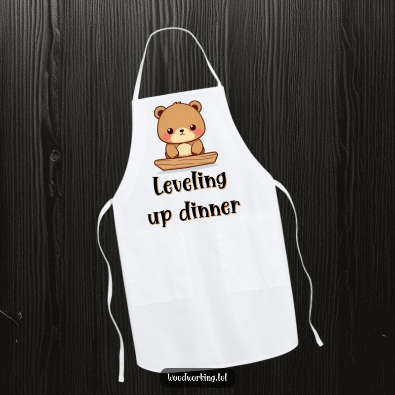 Funny Bear Carpenter Apron depicting a focused bear using a level on wood, a humorous and protective cooking gift.