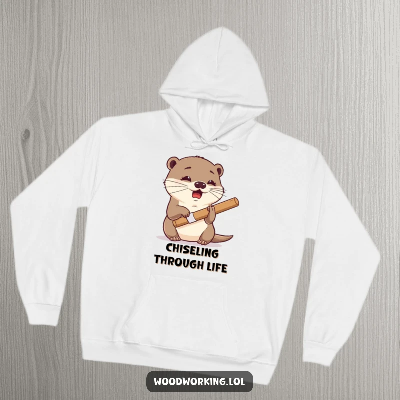 Funny otter hoodie, giggling expression, using a chisel with dexterity, a cozy and humorous representation of artistic talent.