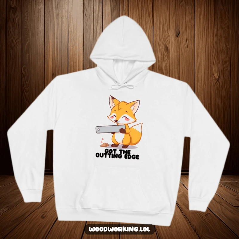 Funny fox hoodie featuring a curious fox holding a saw, offering cozy comfort and humorous planning vibes.