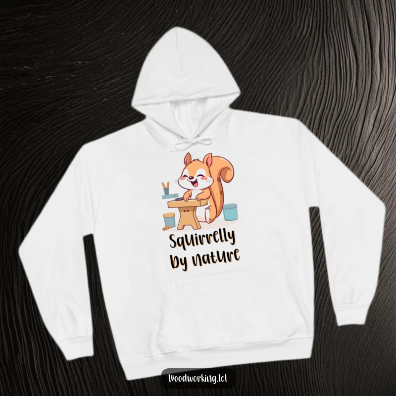 Funny giggling squirrel hoodie, humorously working upside down at a workbench, offering warmth and whimsical workshop vibes.