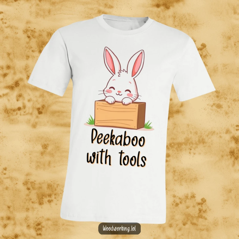 Funny t-shirt of a curious bunny peeking into a wooden toolbox with excitement, ready for new discoveries.