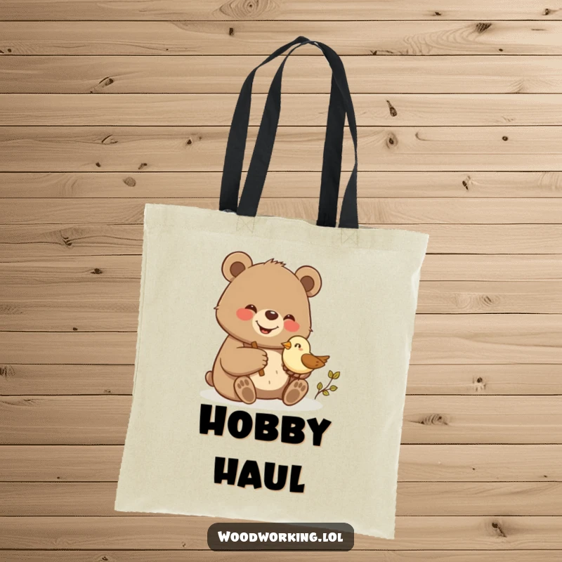 Funny bear giggling while proudly carving a small wooden bird, printed on a spacious and humorous tote bag.